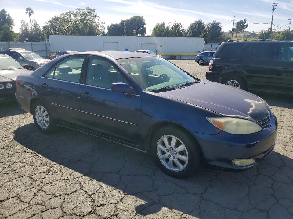 2003 Toyota Camry VIN JTDBF30K830150419 COPART salvage auction — MINOR DENT/SCRATCHES, Ca - Dis/Dlr/Exp Only Clean Title, sold $875 on 2026-07-06 (photo 4)