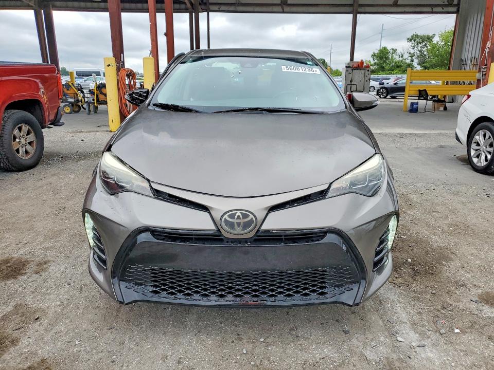 2019 Toyota Corolla VIN 5YFBURHE8KP904883 COPART salvage auction — SIDE, Fl - Cert Of Title Slvg Rebuildable, sold $2,600 on 2026-07-28 (photo 5)