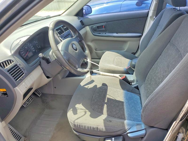 2005 Kia Spectra VIN KNAFE161255071421 COPART salvage auction — FRONT END, TX - NONREPAIRABLE TITLE, sold $250 on 2026-07-06 (photo 7)