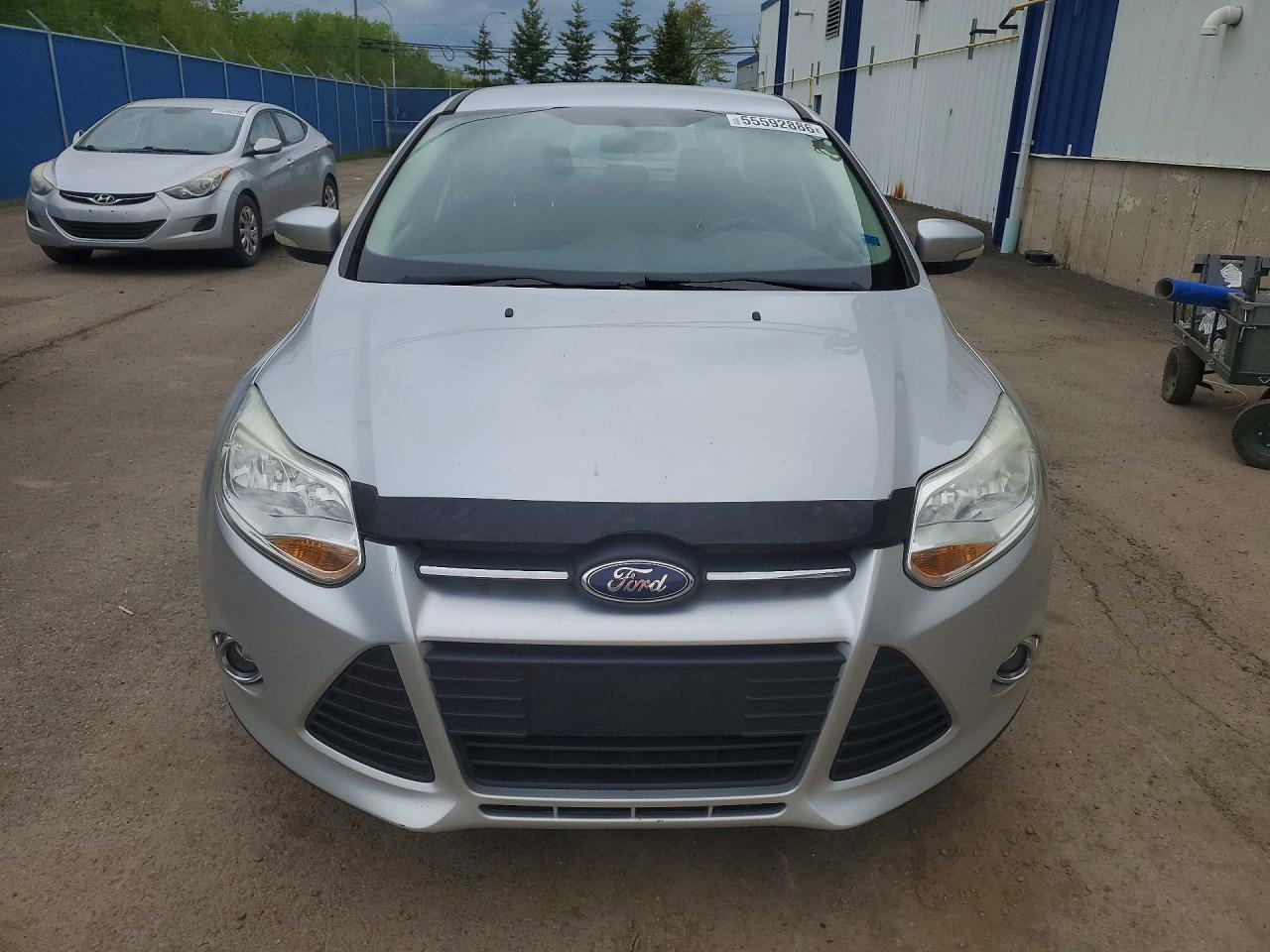 2012 Ford Focus VIN 1FAHP3F2XCL368476 COPART salvage auction — Rear End, St - Salvage Title, sold $325 on 2026-07-09 (photo 5)