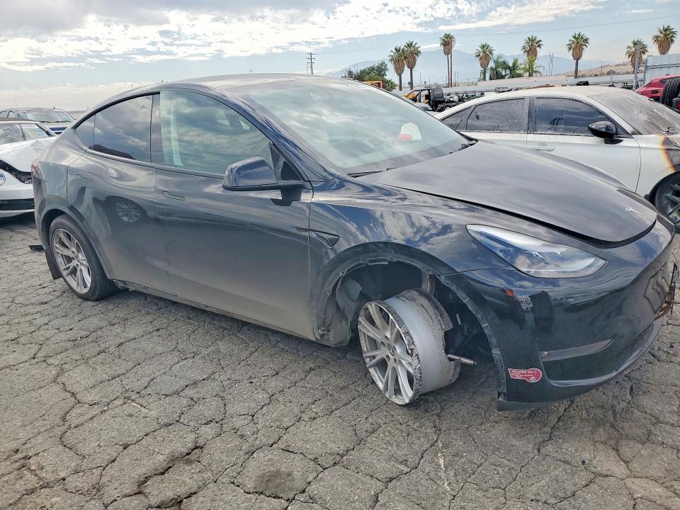 2023 Tesla Model y VIN 7SAYGDEE3PF884606 COPART salvage auction — FRONT END, Ca - Salvage Certificate, sold $9,300 on 2026-07-30 (photo 4)