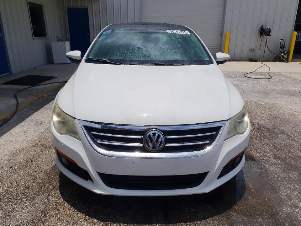 2012 Volkswagen Passat cc VIN WVWHP7AN1CE511953 COPART salvage auction — REAR END, Fl - Cert Of Title Slvg Rebuildable, sold $250 on 2026-08-19 (photo 5)
