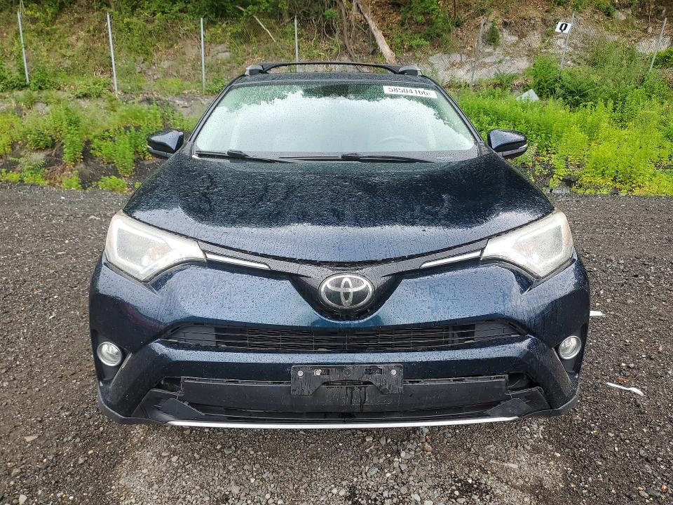 2018 Toyota Rav 4 VIN JTMRFREV0JJ217980 COPART salvage auction — REAR END, NY - MV-907A SALVAGE CERTIFICATE, sold $5,700 on 2026-07-28 (photo 5)
