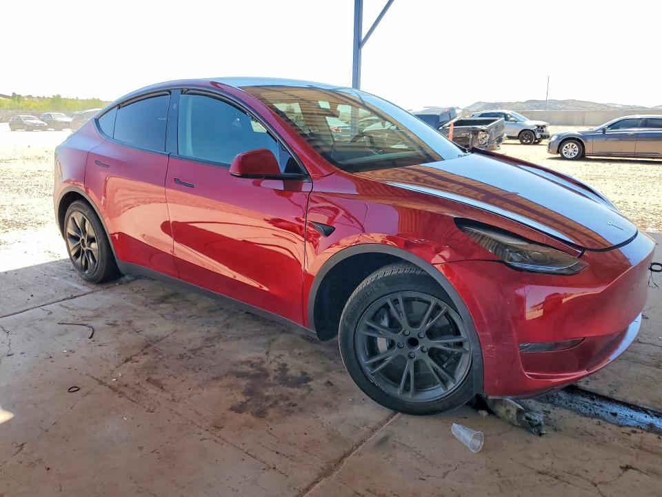 2025 Tesla Model y VIN 7SAYGDED0SF280026 COPART salvage auction — SIDE, Az - Cert Of Title - Salvage, sold $6,100 on 2026-07-28 (photo 4)
