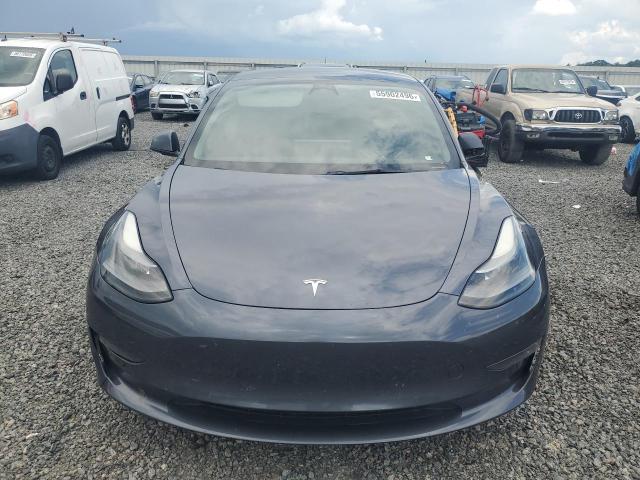 2022 Tesla Model 3 VIN 5YJ3E1EC9NF248327 COPART salvage auction — SIDE, Fl - Certificate Of Destruction, sold $8,600 on 2026-07-10 (photo 5)