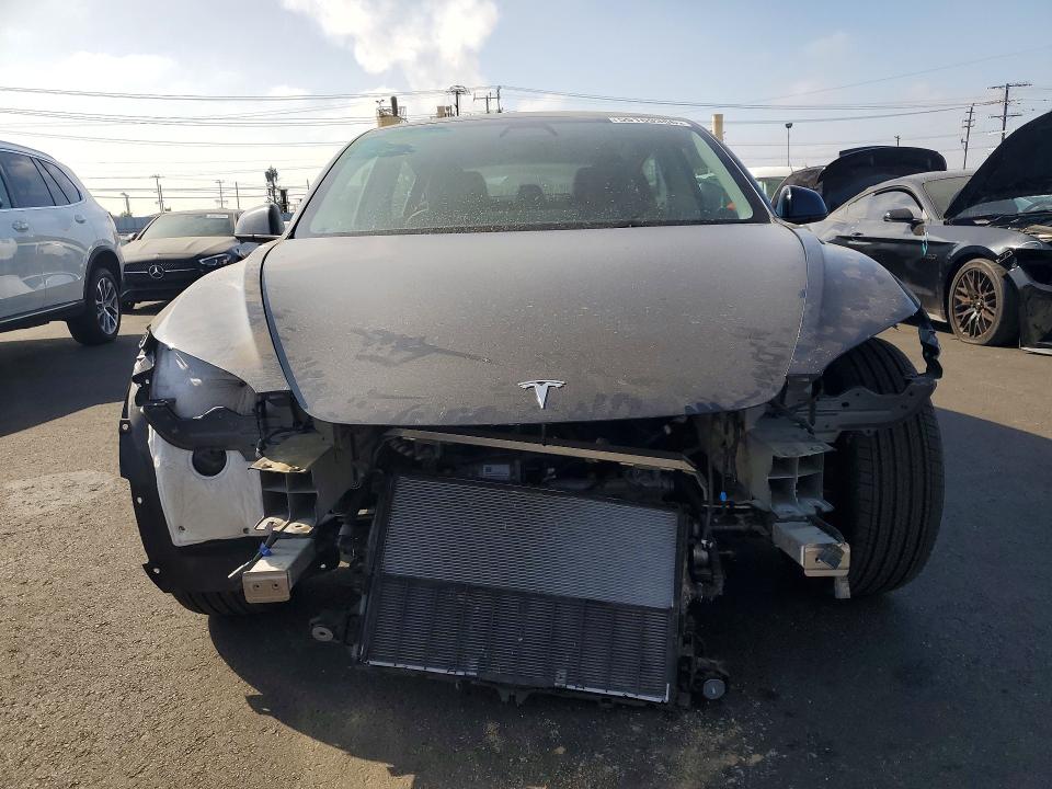 2025 Tesla VIN 5YJ3E1EAXSF082216 COPART salvage auction — FRONT END, Salvage Title, sold $13,000 on 2026-07-13 (photo 5)