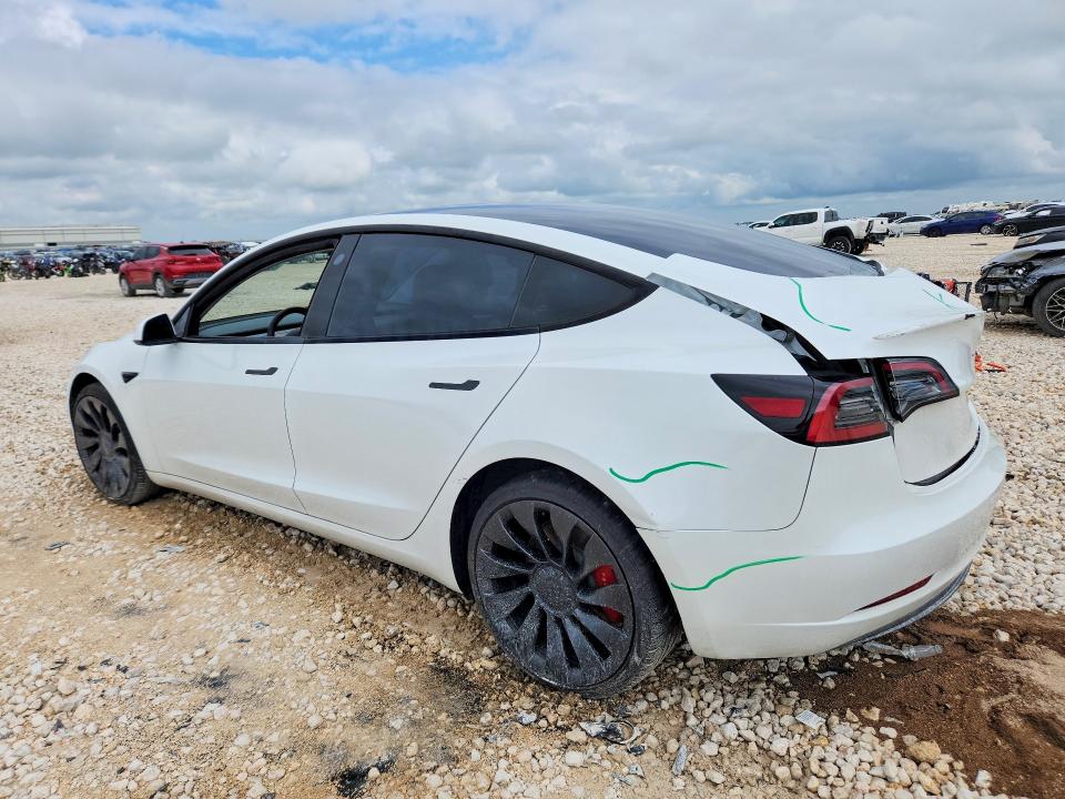 2023 Tesla VIN 5YJ3E1EC8PF503097 COPART salvage auction — REAR END, Tx - Salvage Vehicle Title, sold $2,500 on 2026-07-30 (photo 2)