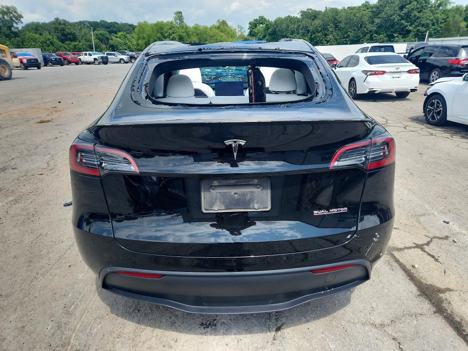 2023 Tesla Model y VIN 7SAYGDEF7PF892359 COPART salvage auction — HAIL, Mo - Salvage Certificate Of Title, sold $12,600 on 2026-07-29 (photo 6)