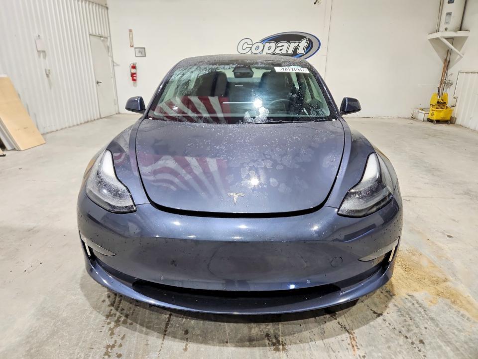 2022 Tesla Model 3 VIN 5YJ3E1EA9NF368563 COPART salvage auction — ALL OVER, Fl - Certificate Of Title, sold $8,600 on 2026-07-06 (photo 5)