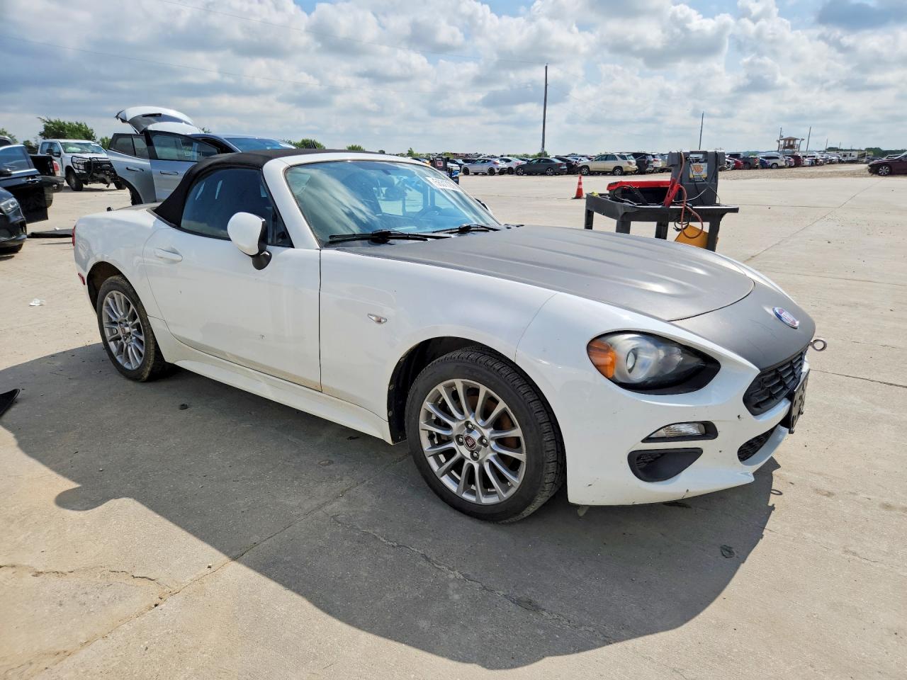 2018 Fiat 124 Spider VIN JC1NFAEK1J0137502 COPART salvage auction — Normal Wear, AR - CERTIFICATE OF TITLE (P), sold $4,350 on 2026-07-09 (photo 4)