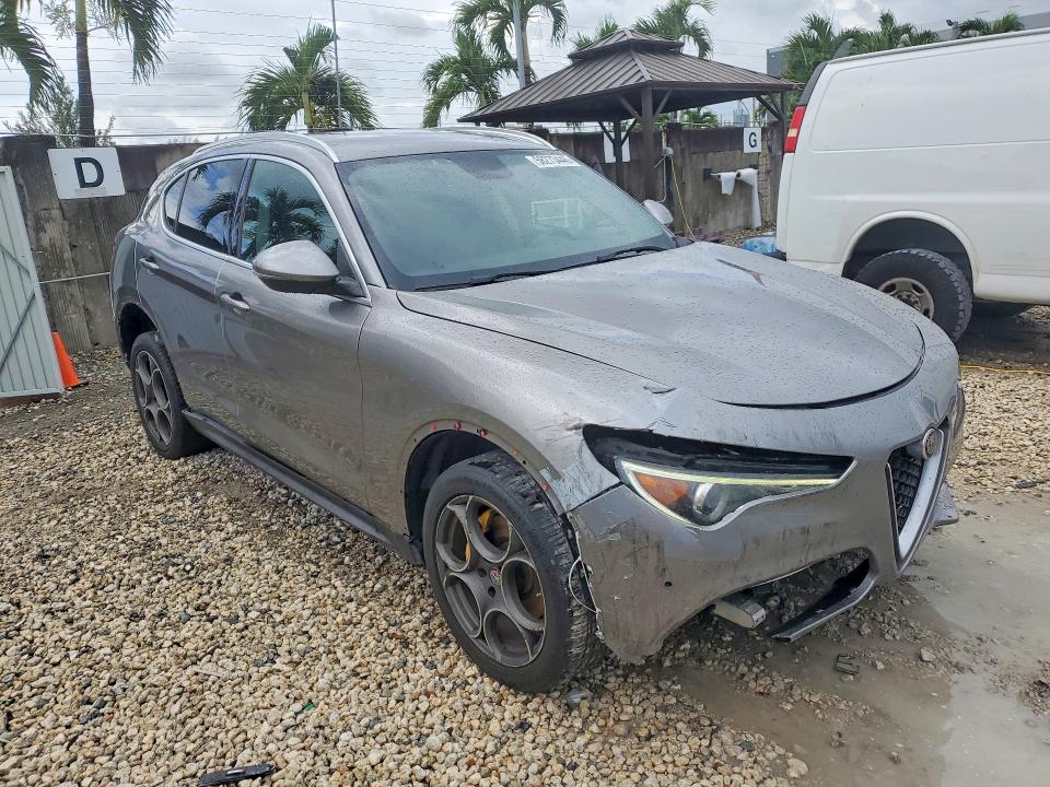 2018 Alfa romeo Stelvio VIN ZASFAKANXJ7B82786 COPART salvage auction — WATER/FLOOD, Fl - Cert Of Title-Slvg Rebld Flood, sold $1,650 on 2026-07-14 (photo 4)