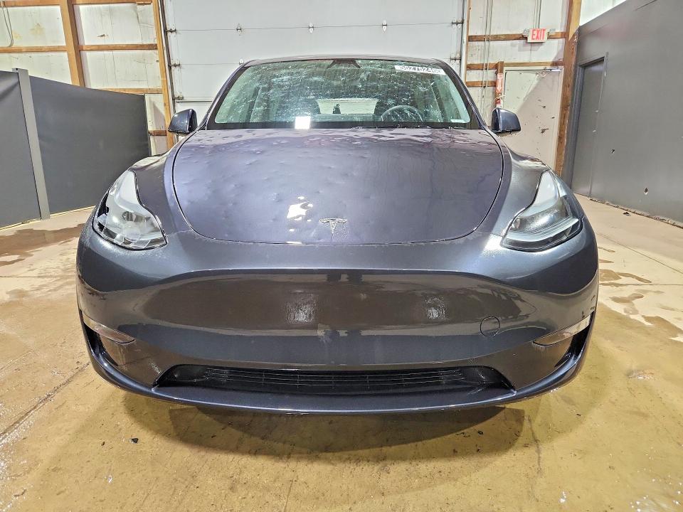 2025 Tesla Model y VIN 7SAYGDEE7SF289184 COPART salvage auction — HAIL, Oh - Certificate Of Title, sold $18,000 on 2026-07-09 (photo 5)