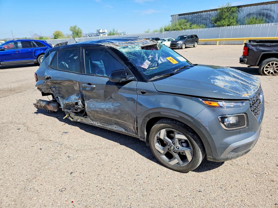 2026 Hyundai VIN KMHRC8A36TU436205 COPART salvage auction — ROLLOVER, AZ - CERT OF TITLE - SALVAGE, sold $1,000 on 2026-07-24 (photo 4)