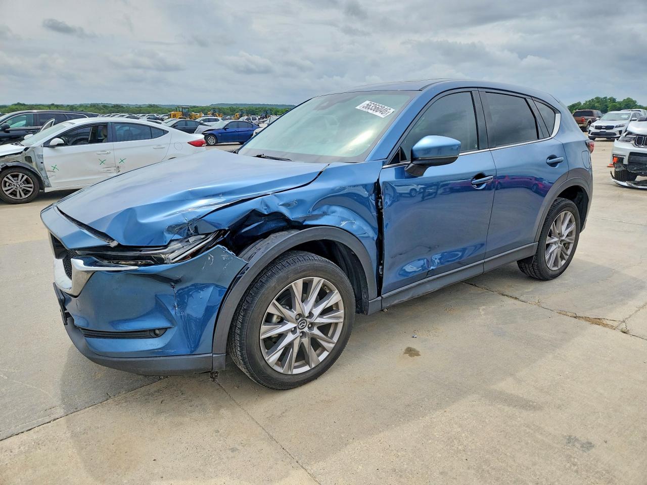 2019 Mazda CX-5 VIN JM3KFADM9K1669737 COPART salvage auction — Side, Sv - Salvage Title, sold $4,750 on 2026-07-09 (photo 1)