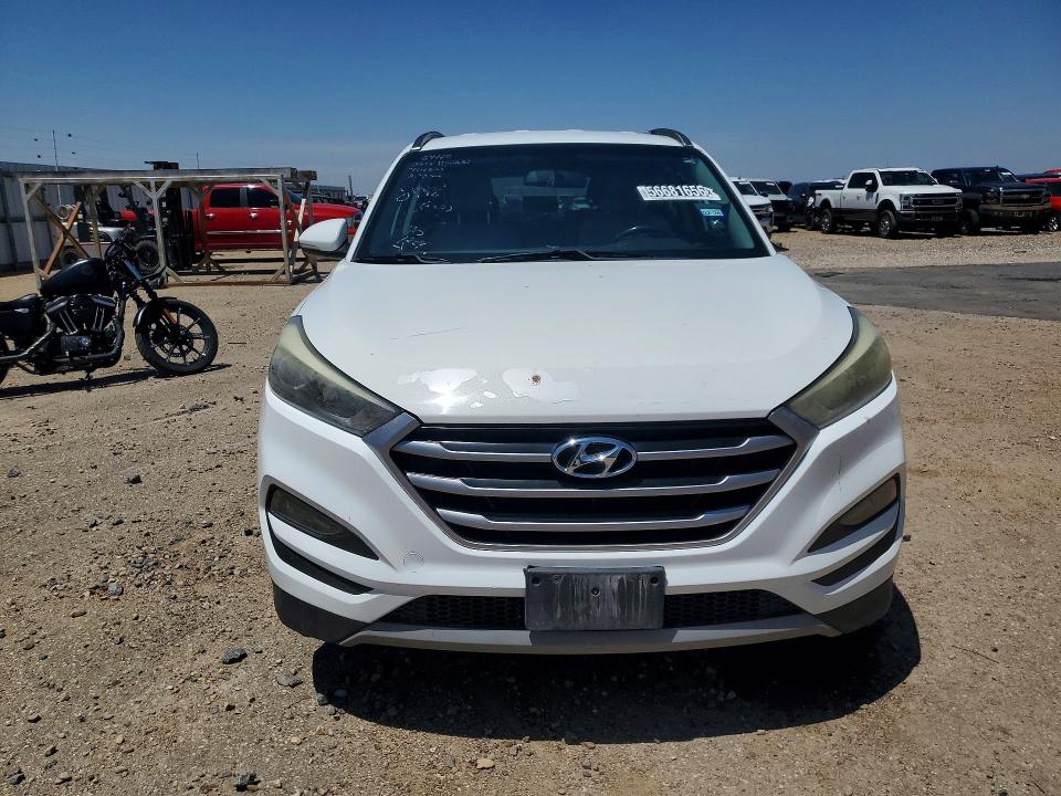 2017 Hyundai Tucson VIN KM8J33A25HU468996 COPART salvage auction — SIDE, Tx - Certificate Of Title, sold $100 on 2026-07-28 (photo 5)