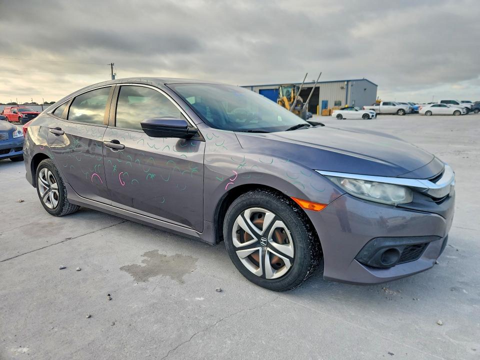 2018 Honda Civic VIN 19XFC2F67JE039704 COPART salvage auction — HAIL, Tx - Certificate Of Title, sold $9,000 on 2026-08-25 (photo 4)