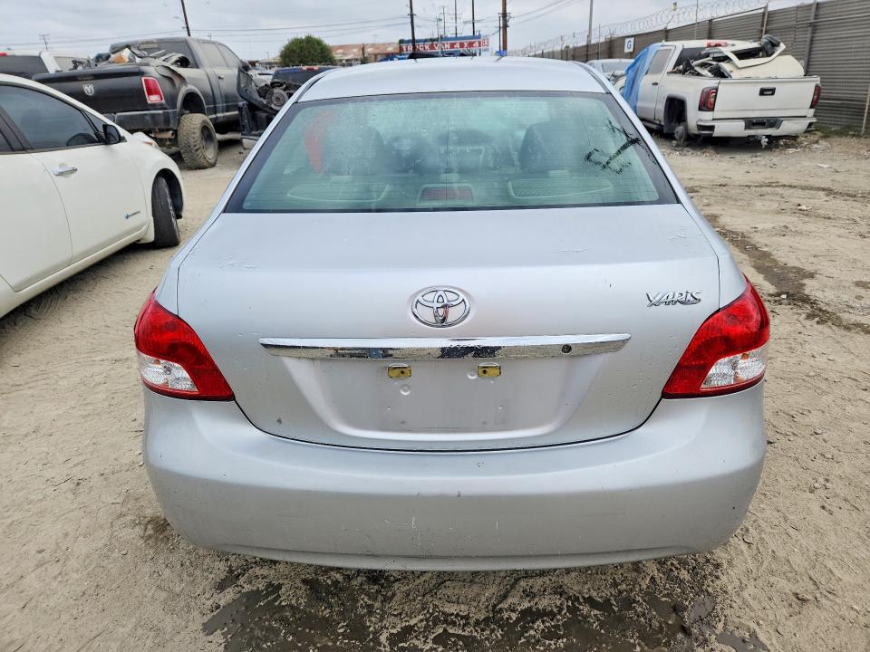 2012 Toyota Yaris VIN JTDBT4K37CL019985 COPART salvage auction — FRONT END, Ca - Salvage Certificate, sold $425 on 2026-07-30 (photo 6)