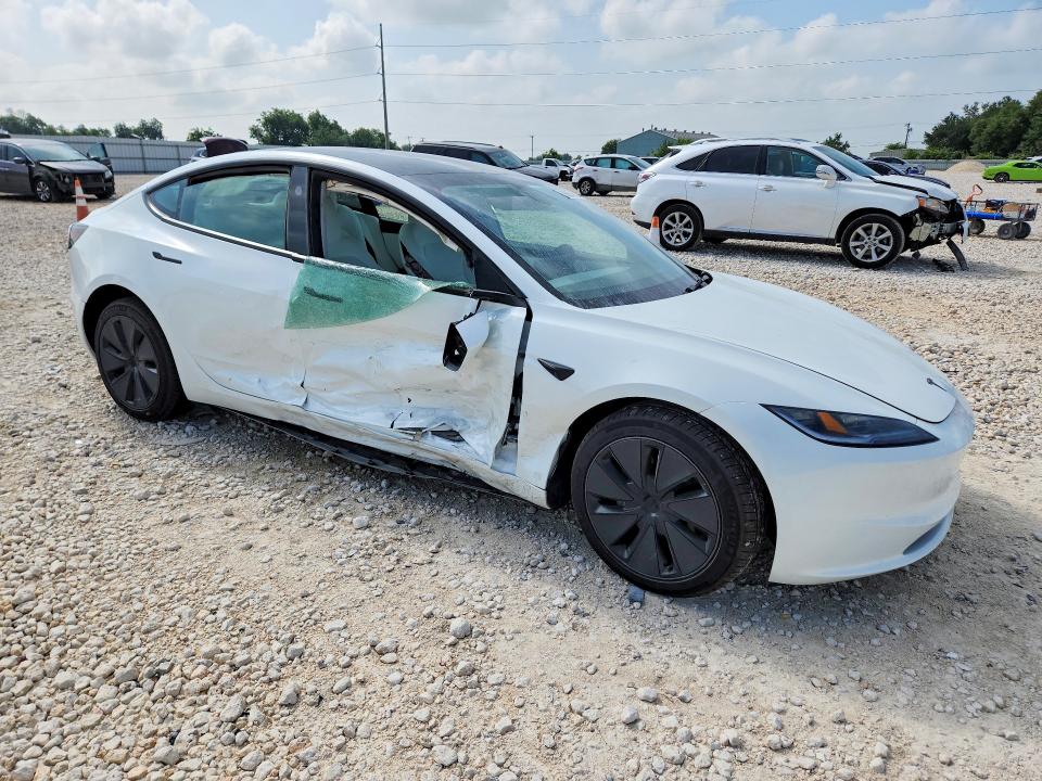 2026 Tesla VIN 5YJ3E1EA8TF139451 COPART salvage auction — SIDE, Tx - Salvage Vehicle Title, sold $13,400 on 2026-08-20 (photo 4)
