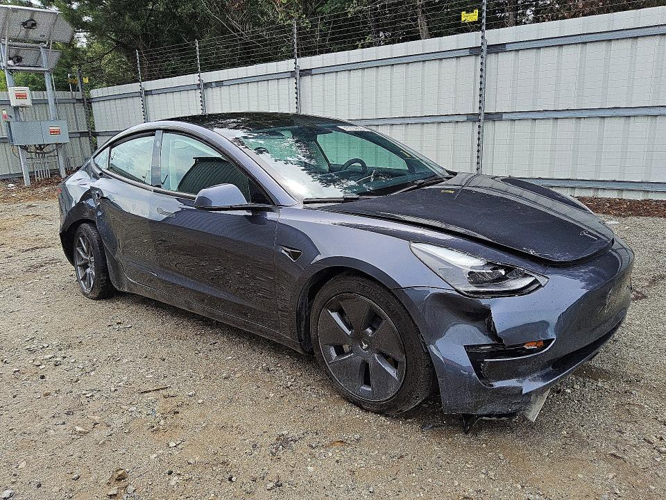2023 Tesla Model 3 VIN 5YJ3E1EA5PF491330 COPART salvage auction — SIDE, GA - CERTIFICATE OF TITLE (P), sold $7,700 on 2026-07-16 (photo 4)