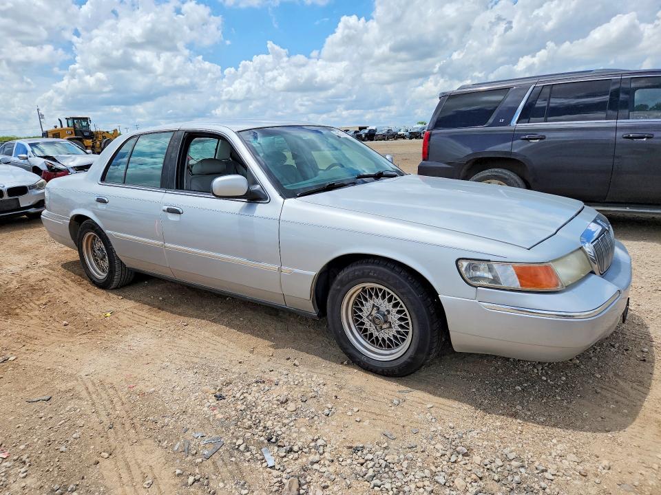 2001 Mercury Grand marquis VIN 2MEFM75W51X602513 COPART salvage auction — SIDE, Tx - Salvage Vehicle Title, sold $500 on 2026-07-02 (photo 4)