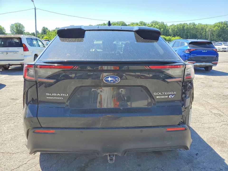 2023 Subaru Solterra VIN JTMABABA1PA000507 COPART salvage auction — SIDE, Ky - Cert Of Title-Salvage, sold $7,700 on 2026-07-13 (photo 6)