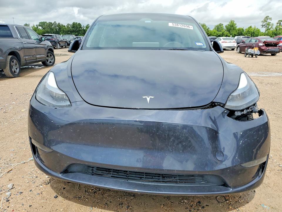 2025 Tesla Model y VIN 7SAYGDED1SA343504 COPART salvage auction — REAR END, TX - SALVAGE VEHICLE TITLE, sold $13,100 on 2026-07-10 (photo 5)