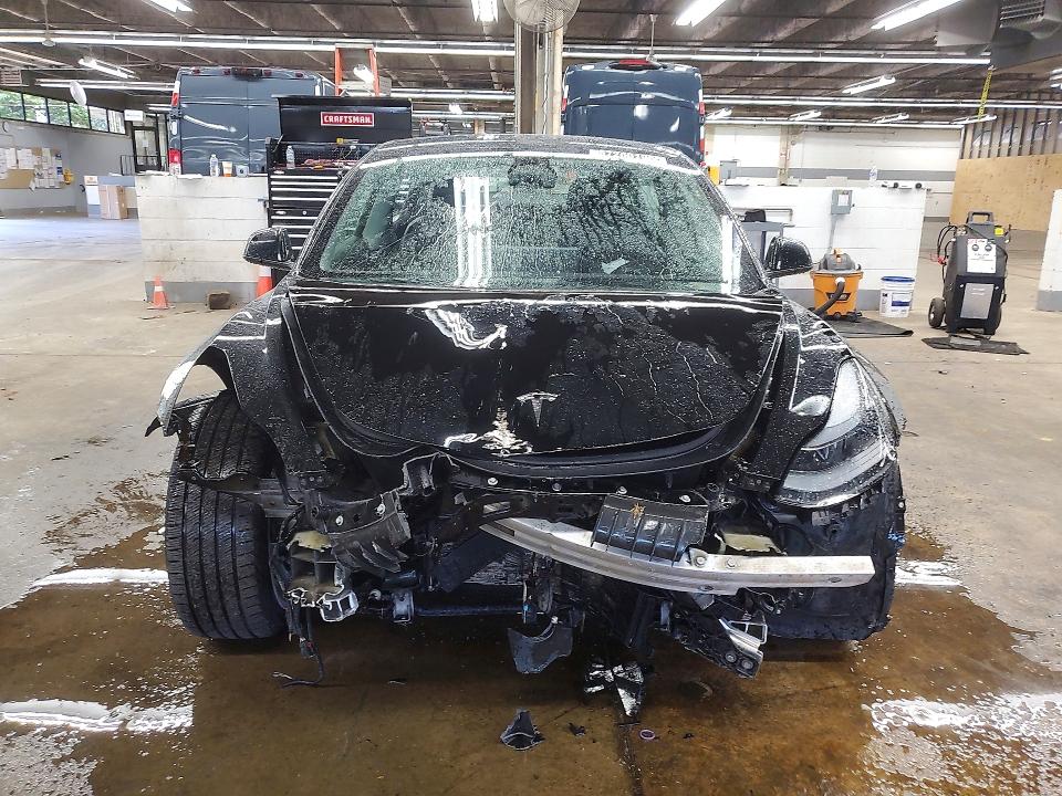 2023 Tesla Model 3 VIN 5YJ3E1EA5PF438031 COPART salvage auction — FRONT END, Il - Salvage Certificate, sold $4,000 on 2026-07-20 (photo 5)