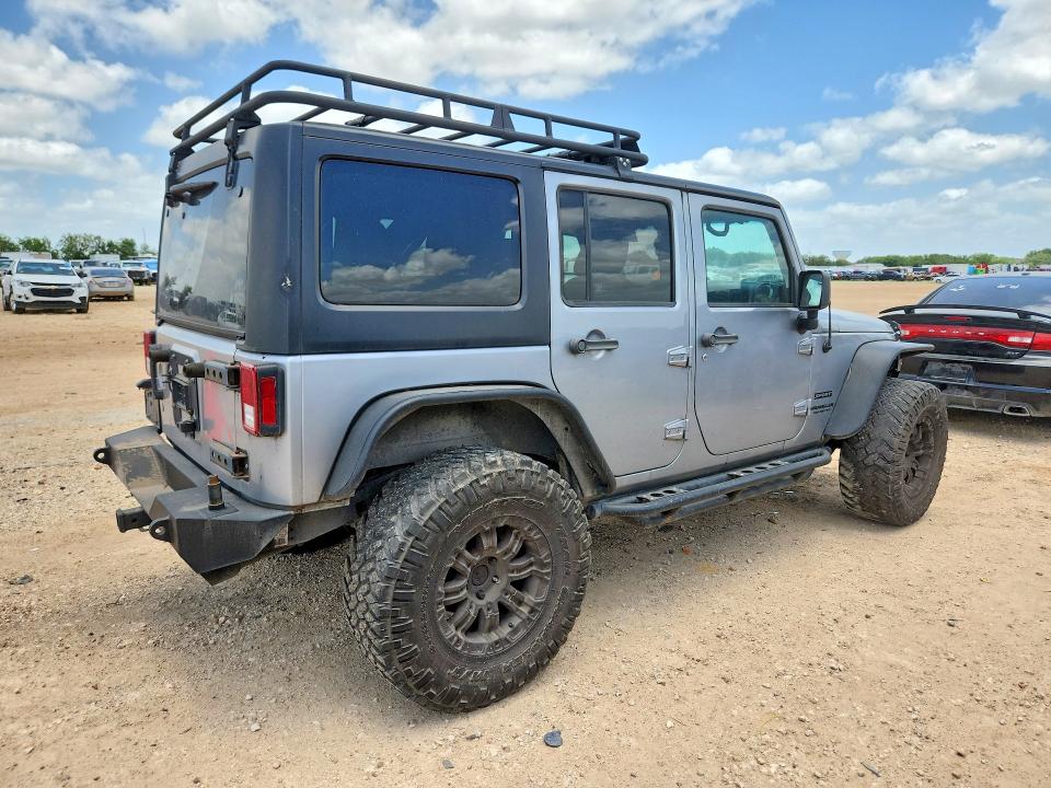 2015 Jeep Wrangler / VIN 1C4BJWDG5FL751277 COPART salvage auction — MECHANICAL, Tx - Certificate Of Title, sold $3,850 on 2026-07-09 (photo 3)