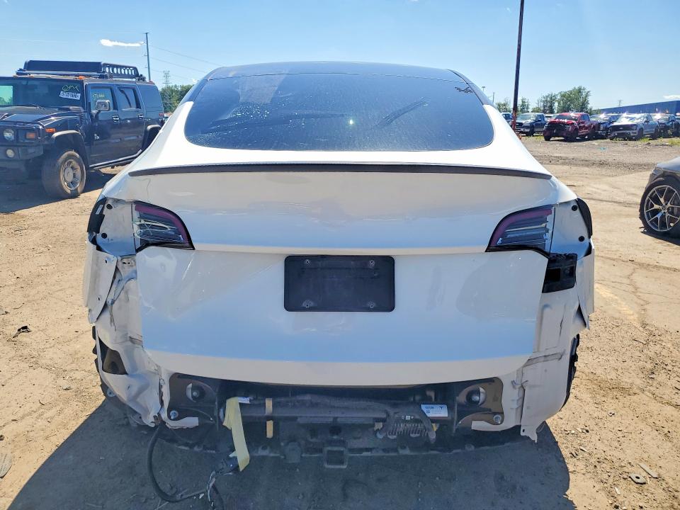 2023 Tesla Model y VIN 7SAYGDEF0PF860093 COPART salvage auction — REAR END, Mi - Cert Of Title-Salvage Vehicle, sold $3,600 on 2026-07-28 (photo 6)