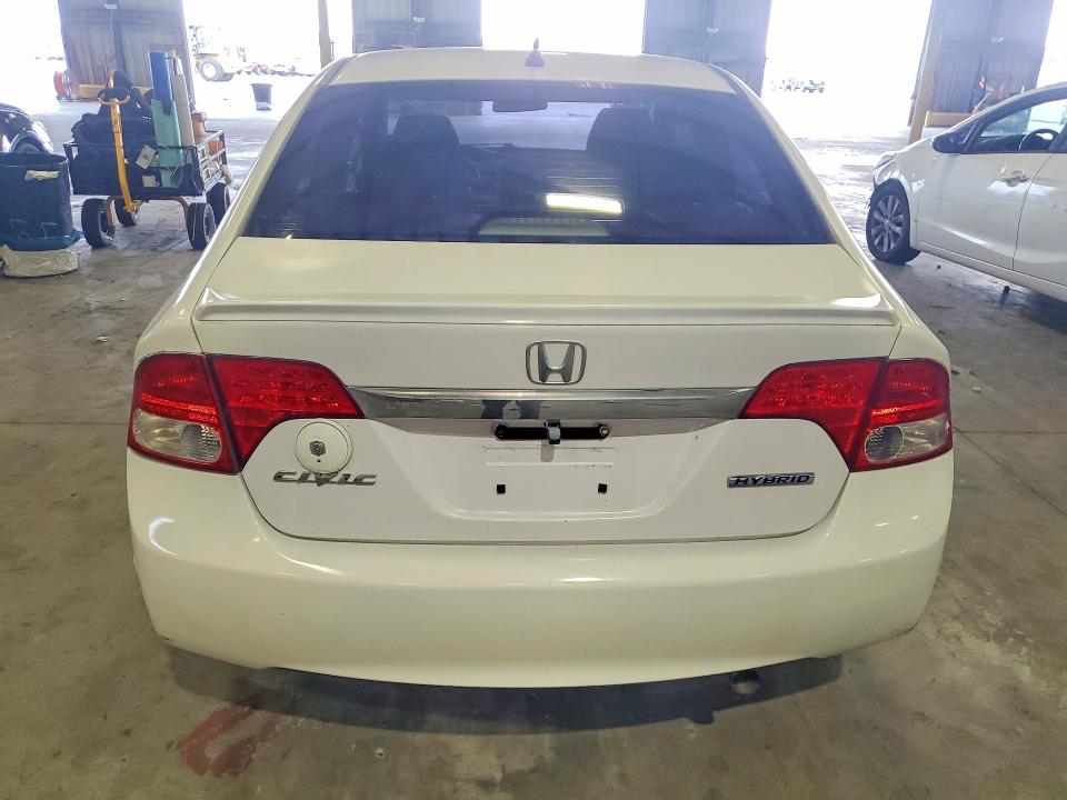 2010 Honda Civic hybrid VIN JHMFA3F22AS007411 COPART salvage auction — MECHANICAL, Fl - Cert Of Title Slvg Rebuildable, sold $400 on 2026-07-13 (photo 6)