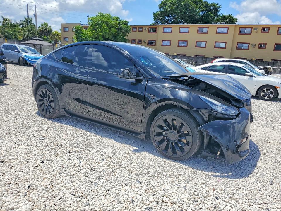 2022 Tesla Model y VIN 7SAYGDEE1NF323379 COPART salvage auction — FRONT END, Fl - Certificate Of Destruction, sold $9,800 on 2026-07-07 (photo 4)