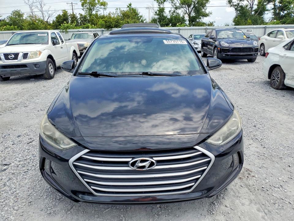 2018 Hyundai VIN KMHD84LFXJU586200 COPART salvage auction — REAR END, FL - CERT OF TITLE SLVG REBUILDABLE, sold $1,950 on 2026-07-14 (photo 5)