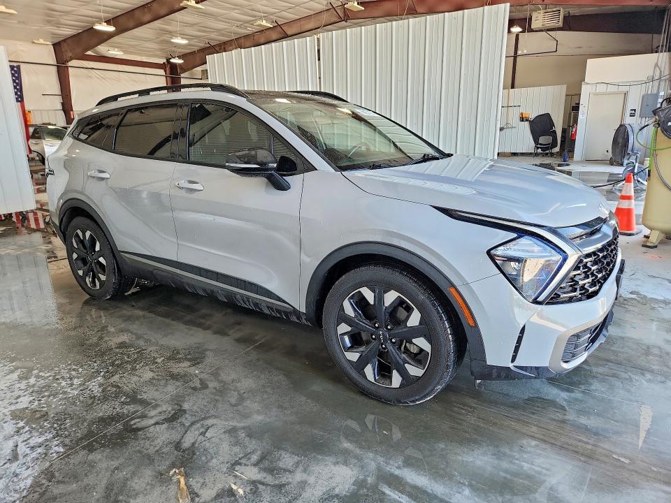 2023 Kia Sportage VIN 5XYK6CAF1PG049062 COPART salvage auction — NORMAL WEAR, Il - Certificate Of Title, sold $14,600 on 2026-07-09 (photo 4)