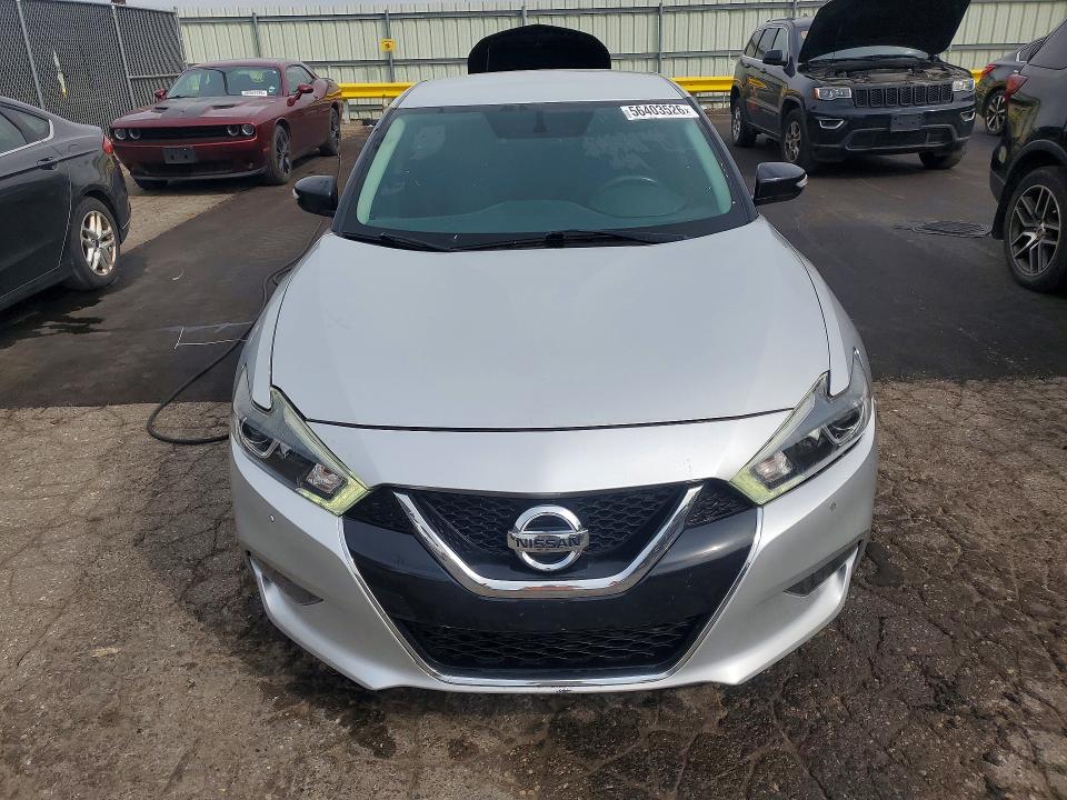 2018 Nissan VIN 1N4AA6AP0JC368006 COPART salvage auction — MINOR DENT/SCRATCHES, Mi - Dealer Only Clean Title (P), sold $3,850 on 2026-07-09 (photo 5)