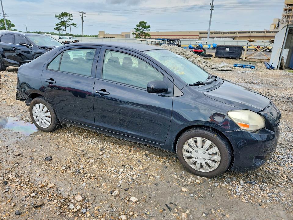 2012 Toyota Yaris VIN JTDBT4K33CL021295 COPART salvage auction — REAR END, Ca - Salvage Certificate, sold $725 on 2026-07-29 (photo 4)