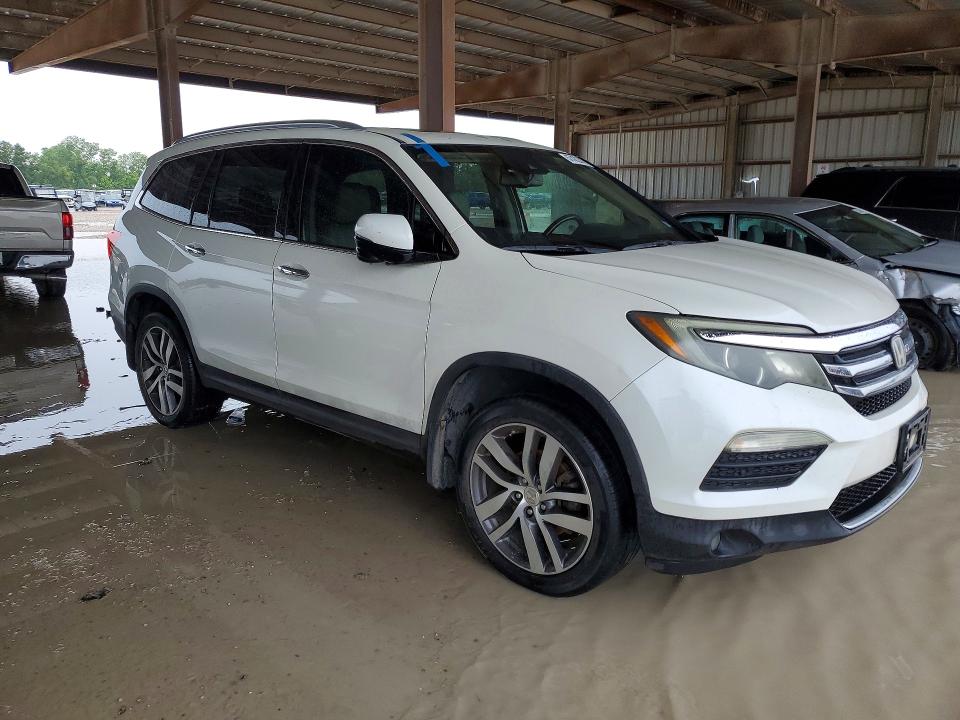 2016 Honda Pilot VIN 5FNYF5H96GB030018 COPART salvage auction — MINOR DENT/SCRATCHES, Tx - Certificate Of Title, sold $2,950 on 2026-07-09 (photo 4)
