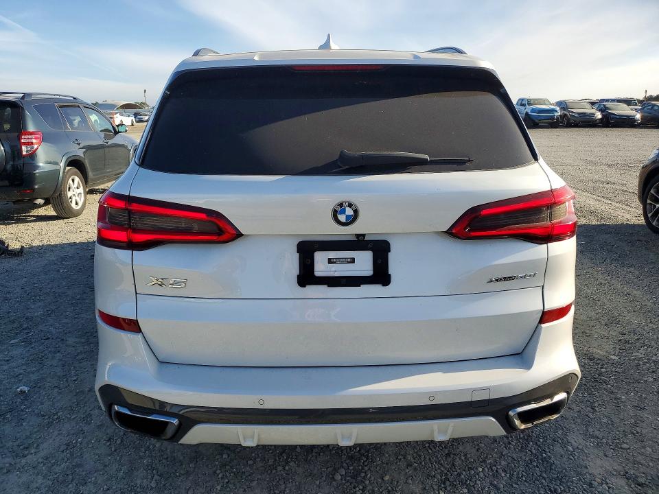 2019 BMW X5 VIN 5UXJU2C57KLN65650 COPART salvage auction — NORMAL WEAR, Wv - Dis/Dlr/Exp Only Clean Title (P), sold $15,900 on 2026-07-07 (photo 6)