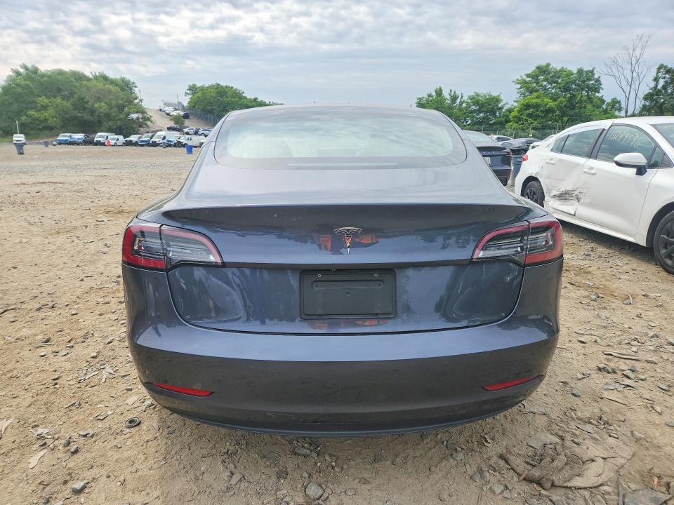 2019 Tesla Model 3 VIN 5YJ3E1EA3KF436299 COPART salvage auction — MINOR DENT/SCRATCHES, Md - Certificate Of Title (P), sold $5,500 on 2026-07-02 (photo 6)
