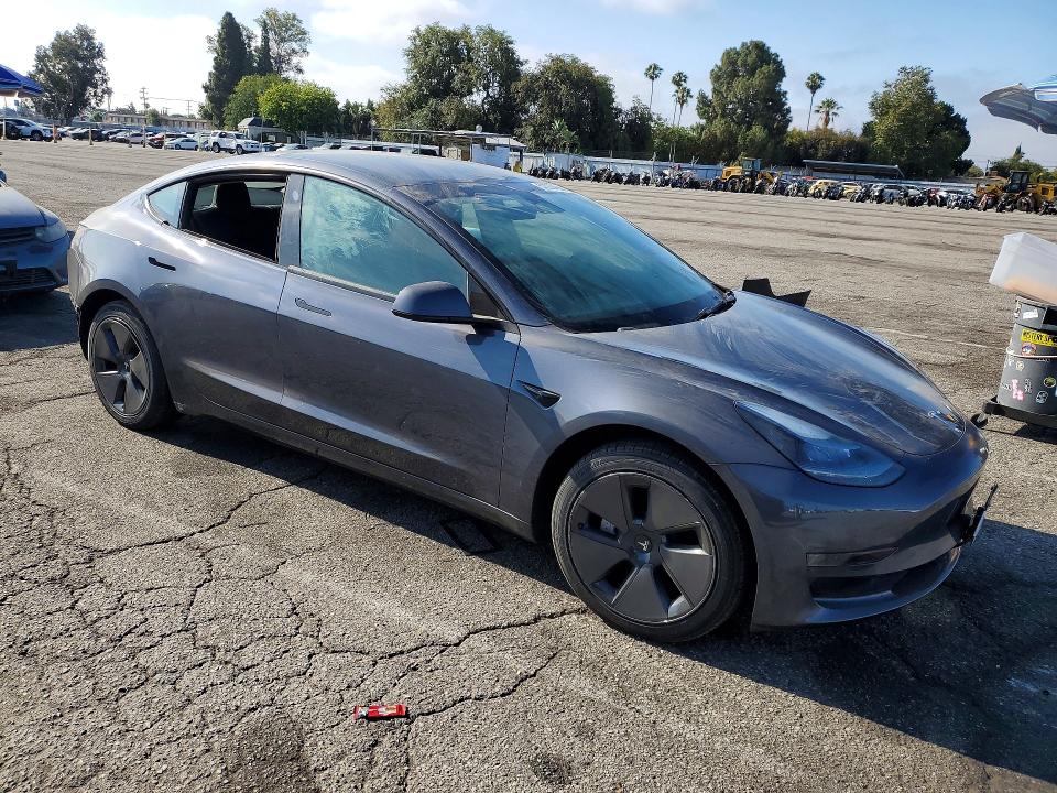 2023 Tesla VIN 5YJ3E1EA0PF581632 COPART salvage auction — REAR END, Ca - Salvage Certificate, sold $5,500 on 2026-07-28 (photo 4)