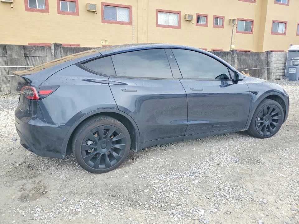 2024 Tesla VIN 7SAYGDEE5RF037184 COPART salvage auction — SIDE, Fl - Cert Of Title Slvg Rebuildable, sold $10,300 on 2026-07-28 (photo 3)