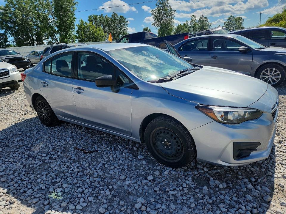 2017 Subaru Impreza VIN 4S3GKAA63H3615587 COPART salvage auction — NORMAL WEAR, Ok - Dealer Only Clean Title, sold $2,300 on 2026-07-09 (photo 4)