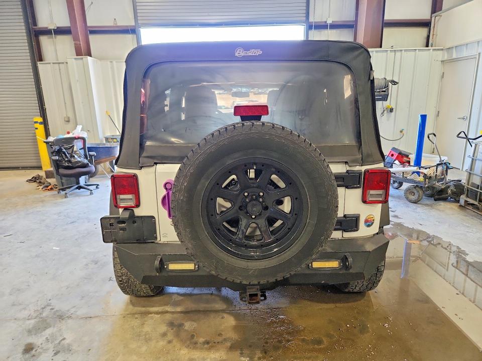 2014 Jeep Wrangler unlimited VIN 1C4BJWDG6EL113215 COPART salvage auction — NORMAL WEAR, In - Certificate Of Title, sold $1,600 on 2026-07-09 (photo 6)