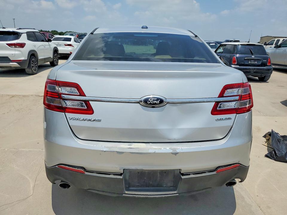 2016 Ford Taurus VIN 1FAHP2D82GG129259 COPART salvage auction — SIDE, Tx - Certificate Of Title (P), sold $2,000 on 2026-07-03 (photo 6)