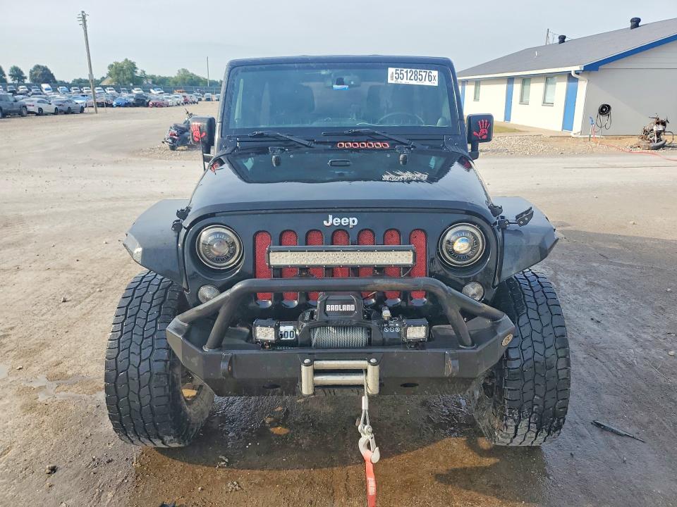 2014 Jeep Wrangler unlimited VIN 1C4BJWDG8EL120036 COPART salvage auction — ALL OVER, Mo - Salvage Certificate Of Title, sold $50 on 2026-08-10 (photo 5)