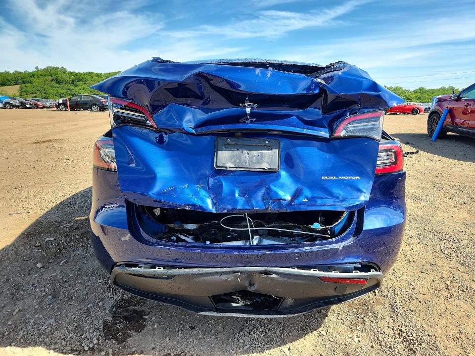 2023 Tesla Model y VIN 7SAYGDEE0PA205372 COPART salvage auction — REAR END, Il - Salvage Certificate, sold $9,900 on 2026-07-29 (photo 6)