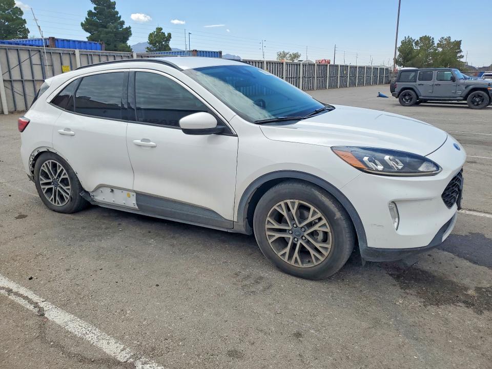 2020 Ford Escape VIN 1FMCU9H91LUB30449 COPART salvage auction — SIDE, Tx - Salvage Vehicle Title, sold $3,600 on 2026-07-24 (photo 4)