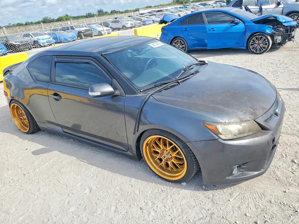 2012 Scion VIN JTKJF5C7XC3041420 COPART salvage auction — MINOR DENT/SCRATCHES, Fl - Cert Of Title-Rebuilt, sold $375 on 2026-07-29 (photo 4)