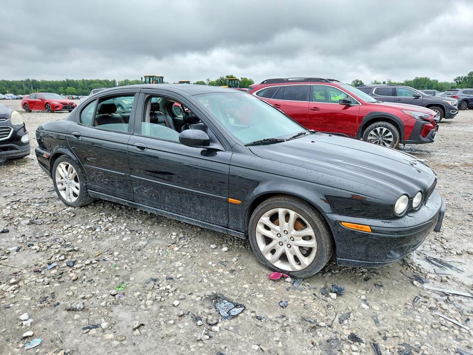2002 Jaguar X type VIN SAJEA53D22XC47890 COPART salvage auction — SIDE, Il - Salvage Certificate, sold $225 on 2026-08-03 (photo 4)