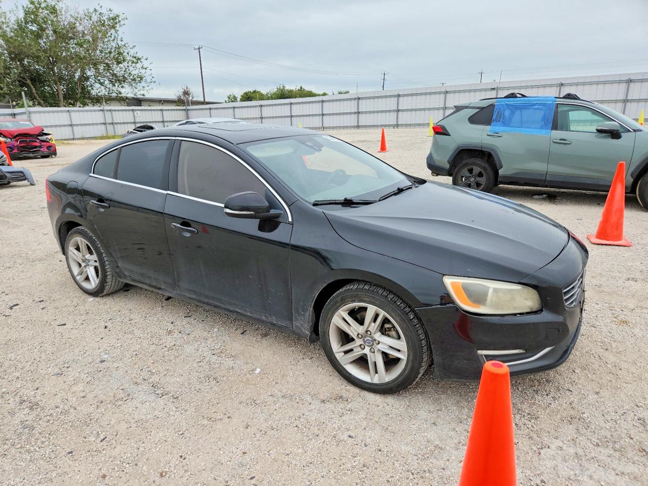 2015 Volvo S60 VIN YV140MFC3F1313129 COPART salvage auction — Side, TX - CERTIFICATE OF TITLE, sold $900 on 2026-07-09 (photo 4)