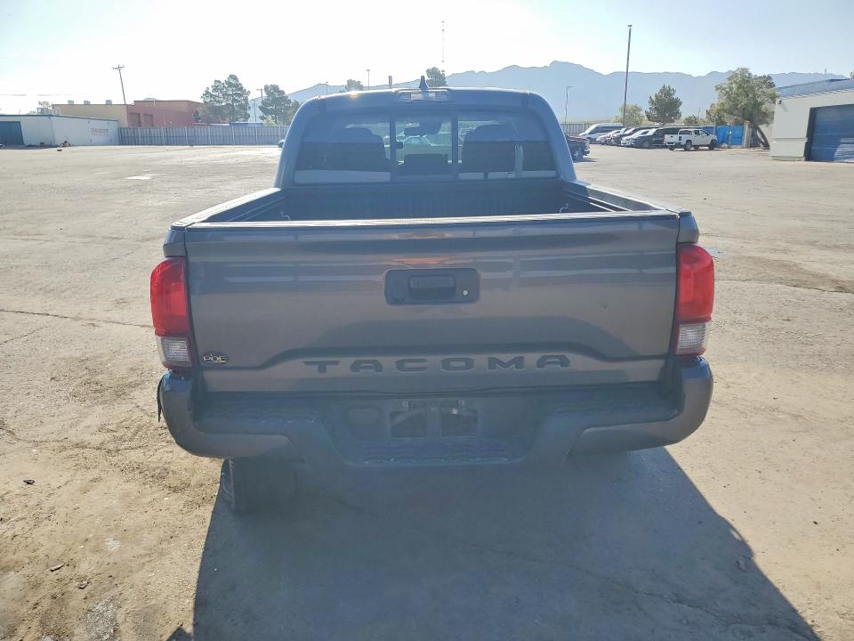 2020 Toyota Tacoma VIN 5TFAX5GN9LX183828 COPART salvage auction — SIDE, Tx - Salvage Vehicle Title, sold $9,000 on 2026-07-17 (photo 6)